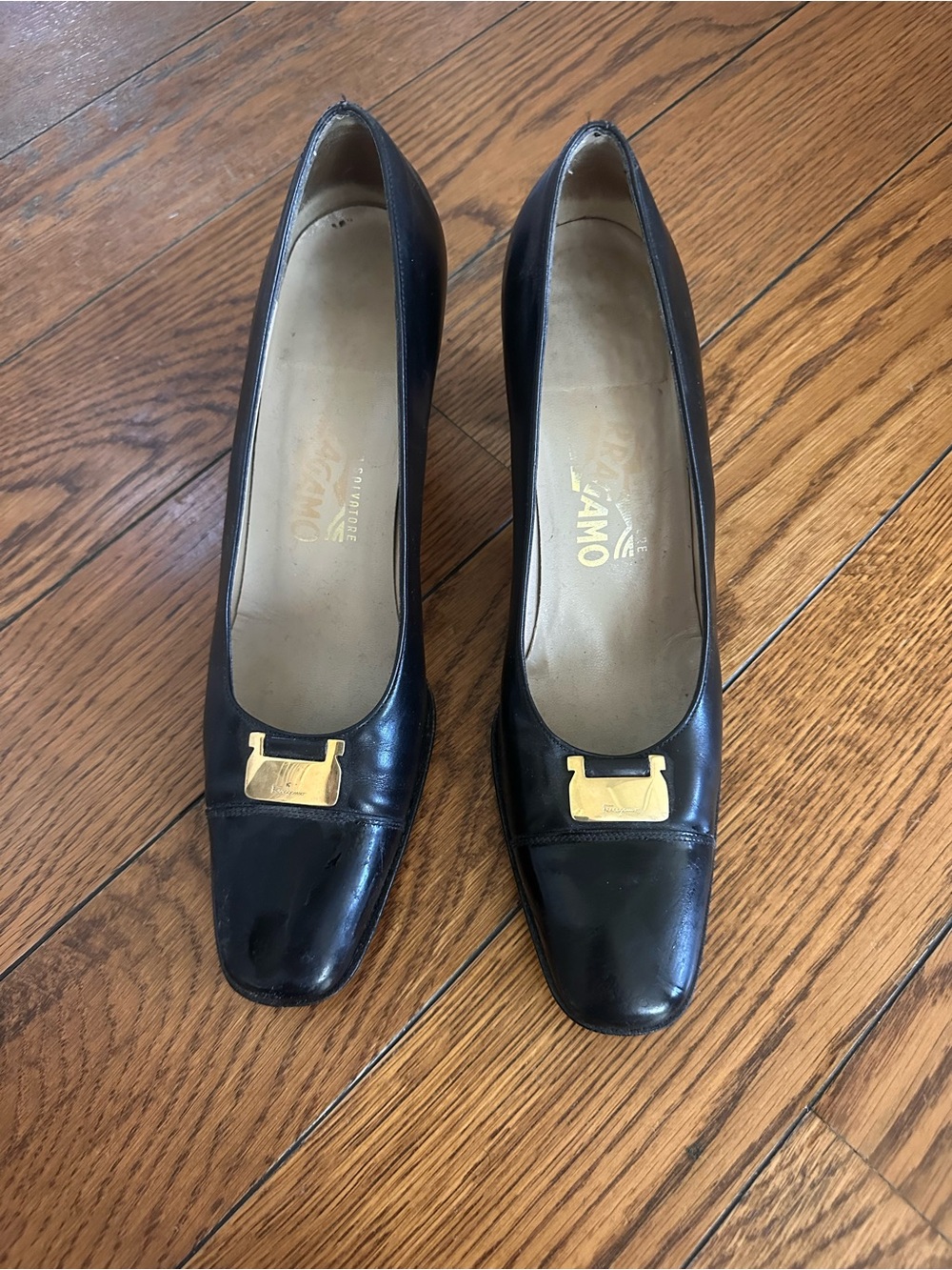 Salvatore Ferragamo Black Leather Pumps with Gold Buckle